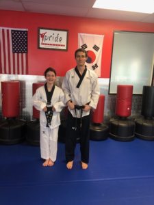 New black belt student with Master Hall